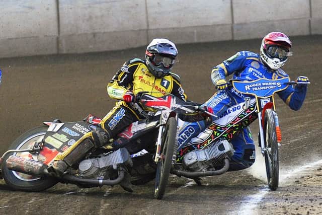 Chris Harris (left) in action..