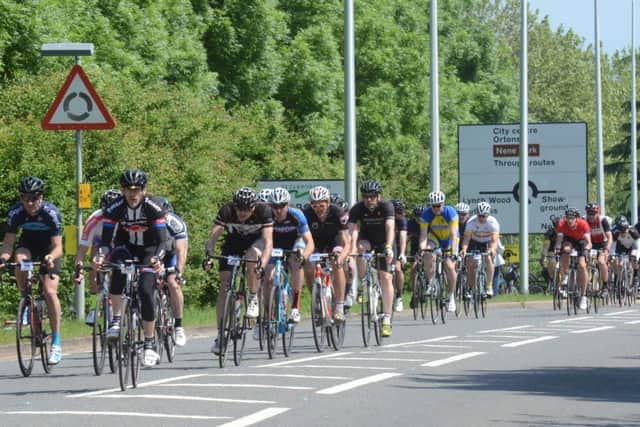 Action from the 2016 Tour of Cambridgeshire Gran Fondo start outside the East of England Showground on Oundle Road EMN-160506-185945009