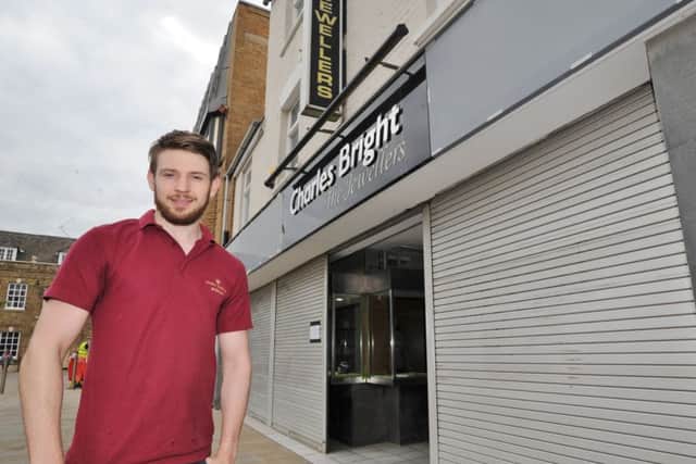 Matt Powell outside the new shop being fitted out at Exchange Street EMN-170530-171417009