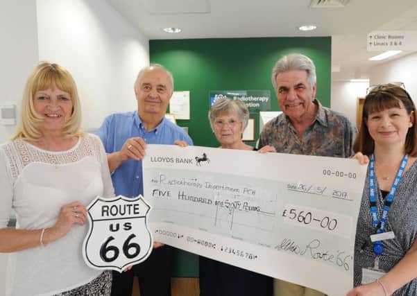Sandee and Peter Lane, and Graham and Jean Seal, handing over a cheque to Sue Cunnington, radiotherapy manager at the hospital.