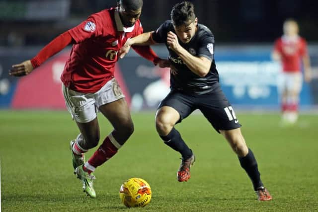 Mark Little (left) in action for Bristol City against Posh.