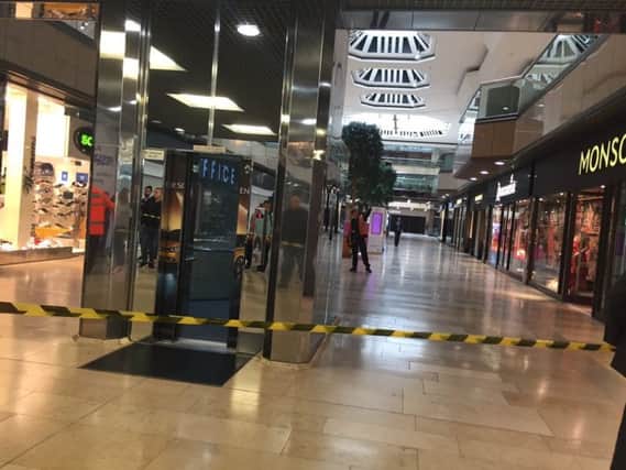 The scene inside Queensgate as the evacuation continues
