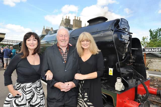 40th anniversary VIP day at Nene Valley Railway at Wansford. Bond girls Carole Ashby and Alison Worth with Bond film director John Glen. EMN-170106-191633009