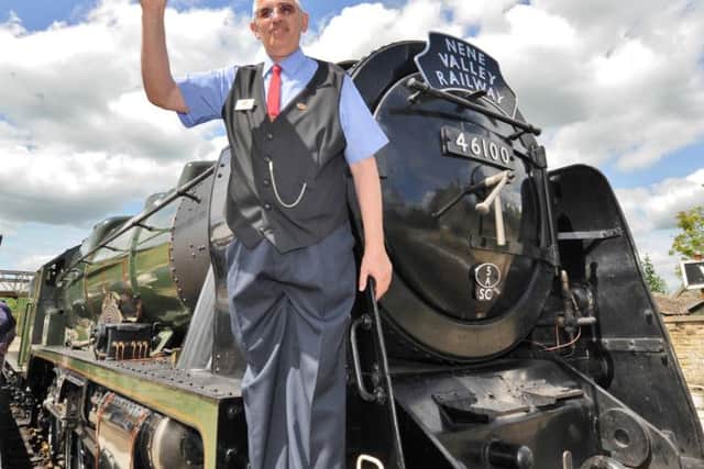 40th anniversary VIP day at Nene Valley Railway at Wansford.  David Jackson, the  guard who waved out the first ever train on the NVR line 40 years ago EMN-170106-191803009