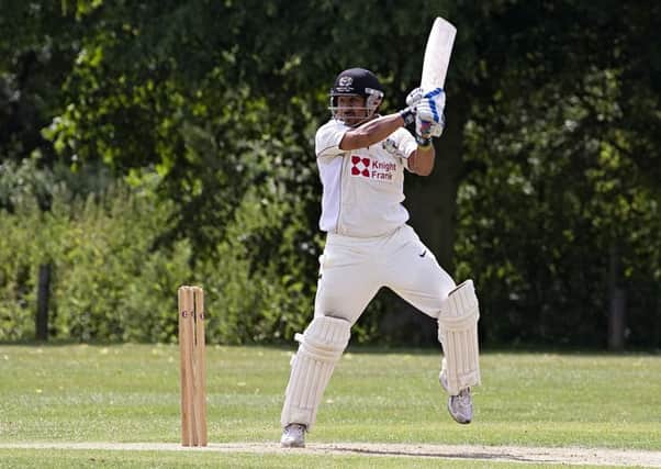 Asim Butt in action for Cambs.