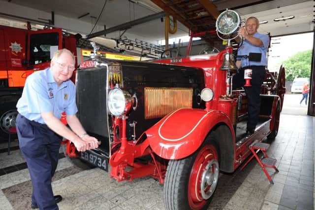 Whittlesey Fire Station 50th anniversary open day.  George Dunlop and John Kee with their 1931 Fire Engine EMN-170306-190149009