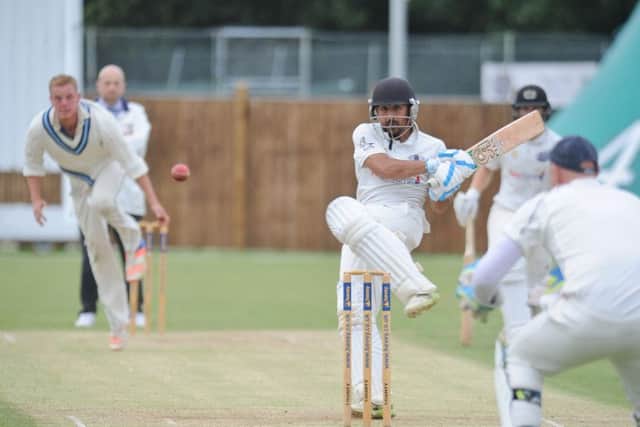 Asim Butt hits out for Peterborough Town in their Twenty/20 win over Rushden. Photo: David Lowndes.