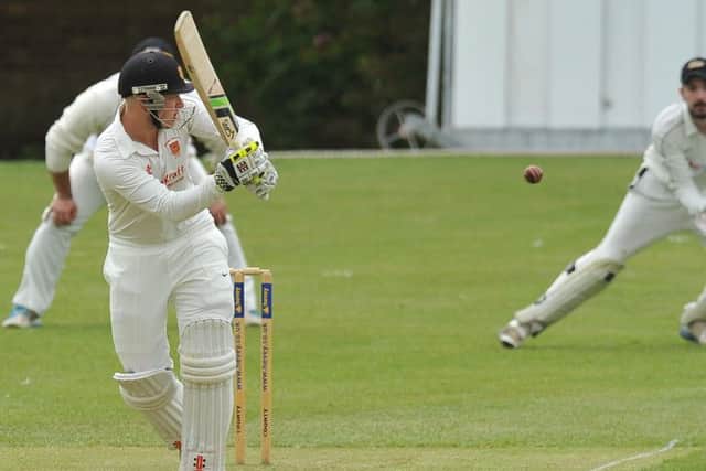Skipper Mark Hodgson in action for Oundle.