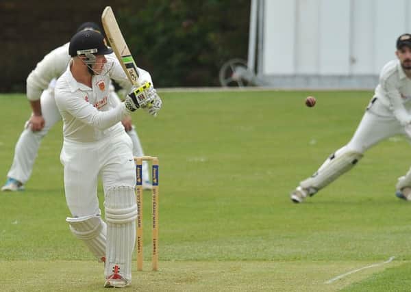 Skipper Mark Hodgson in action for Oundle.