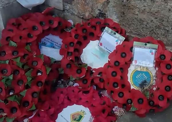 Wreaths are a permanent fixture at the memorial