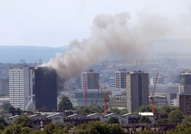 Smoke billows from a fire that has engulfed the 24-storey Grenfell Tower in west London. PRESS ASSOCIATION