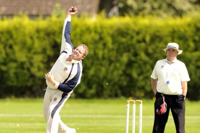 Five wickets and a ton for Gary Freear of Wisbech against Saffron Walden.
