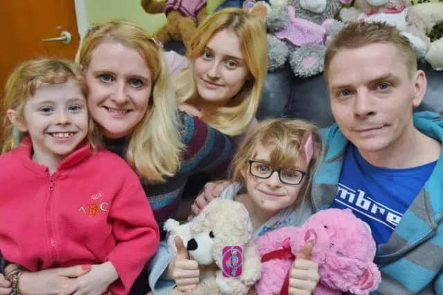 Elisha Hills-Steedman (10) with family Annalise Hills-Steedman (6), Celeste Hills (16) and parents Michelle and Andy Steedman recovering after the crash in February.