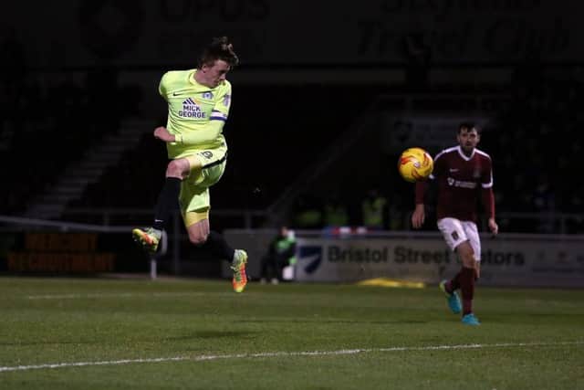 Posh midfielder Chris Forrester nods home the winning goal at Northampton last season.