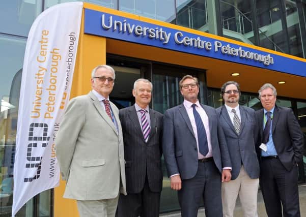 From left to right; Councillor John Holdich, John Clark, Mayor James Palmer, James Larner and Tony West at University Centre Peterborough. Picture by Joe Dent 0253448893