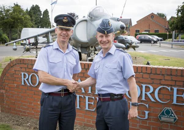 Group Captain Rich Pratley (left) hands over to Group Captain Tony Keeling (right)
