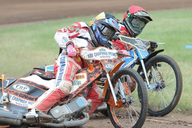 In-form Panthers star Jack Holder (red helmet) during heat four of the meeting against Glasgow. Photo: David Lowndes.
