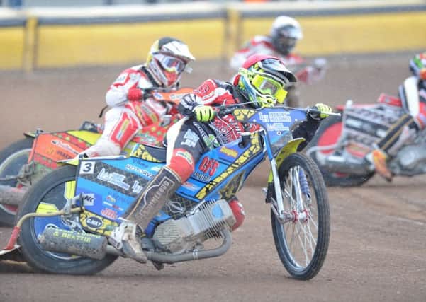 Paul Starke (red helmet) in action in heat five of Panthers' meeting with Glasgow. Photo: David Lowndes.