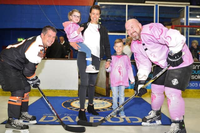 Peterborough Pirates Vets v Halles All Stars  at Planet Ice.  Team captains Kevin King and Tim Heriot with Fran and Halle Heriot at the face off. EMN-170625-085557009