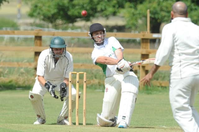 Will Jex hits out for Castor against Ufford Park. Photo; David Lowndes.