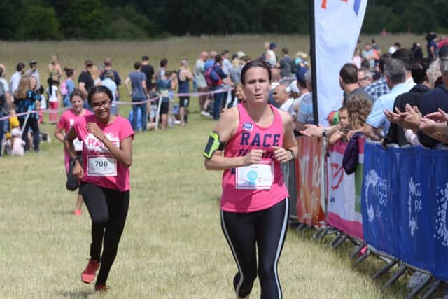 Race for Life 2017 at Ferry Meadows.   Runners  finishing EMN-170207-194612009
