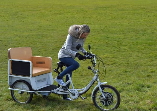 The victim's daughter with the electric trike