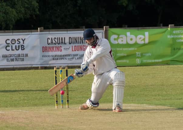 James Pope hits out for Nassington in the Burghley sixes. Photo: James Biggs.