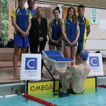 Pictured standing behind the new backstroke starting ledges supplied by Copleys are from the left  Myles Robertson-Young, COPS chairman Richard Leech, Lucy Arden from Copleys, Emma Leslie, Mia Leech and Henry Pearce.