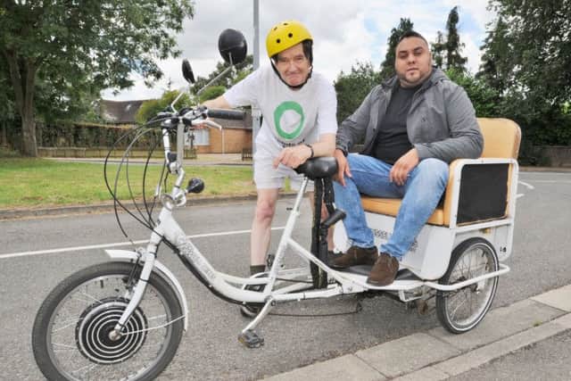 Roger Simpson whose bike was stolen with Ali Shan, a taxi driver who was responsible for its return. EMN-170507-161122009