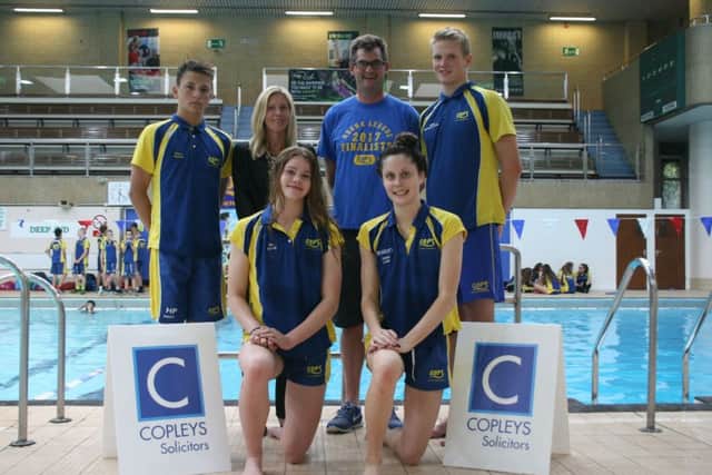 COPS swimmers are pictured with Lucy Arden from sponsors Copleys. From the left are, back, Henry Pearce, Lucy Arden, Richard Leech COPS chairman, Myles Robertson-Young, front, Mia Leech and Emma Leslie.