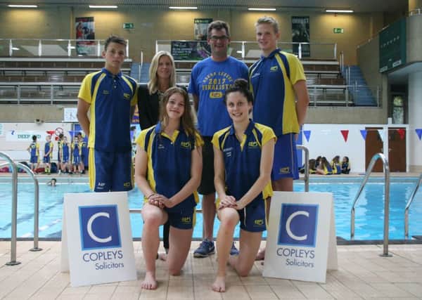 COPS swimmers are pictured with Lucy Arden from sponsors Copleys. From the left are, back, Henry Pearce, Lucy Arden, Richard Leech COPS chairman, Myles Robertson-Young, front, Mia Leech and  Emma Leslie.