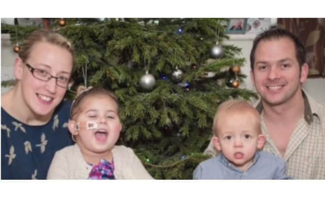 Mikayla, with mum Alyson, brother Alfie and dad Neil