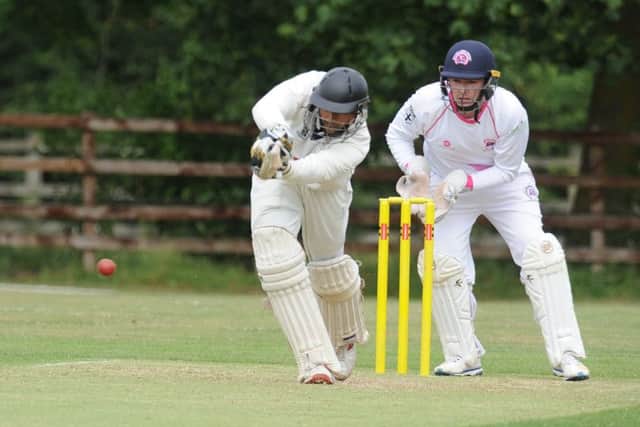 Parth Patel on his way to 27 for Wisbech at Ketton. Photo: David Lowndes.