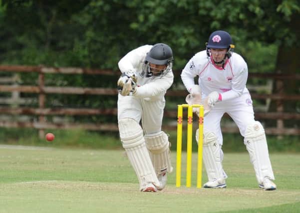 Parth Patel on his way to 27 for Wisbech at Ketton. Photo: David Lowndes.
