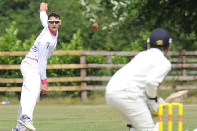 Stylish Tom Sole bowling for Ketton against Wisbech. Photo: David Lowndes.