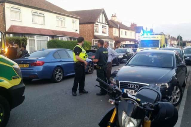Police and paramedics in Priory Road. Photo: Community First Residents Association