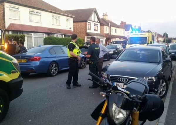 Police and paramedics in Priory Road. Photo: Community First Residents Association