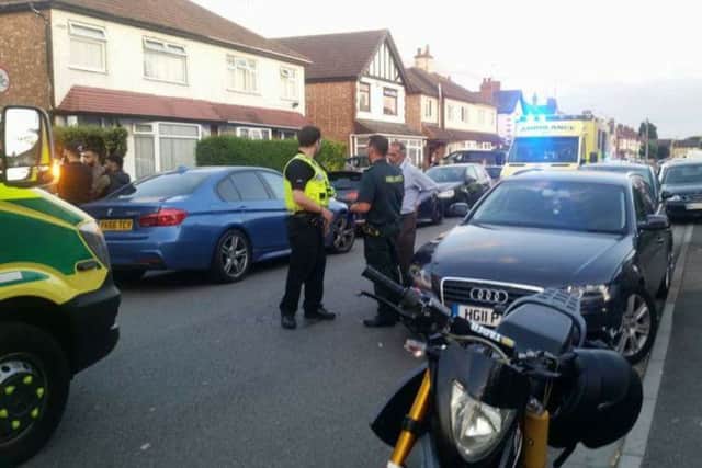 Police and paramedics in Priory Road. Photo: Community First Residents Association