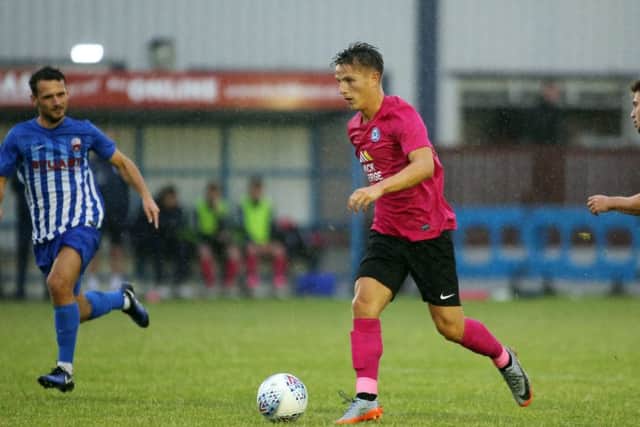 Tom Nichols in possession for Posh at Nuneaton. Photo: Joe Dent/theposh.com.