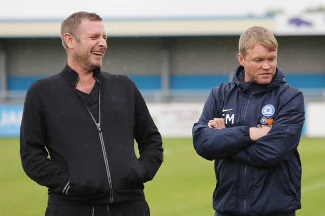 Posh manager Grant McCann (right) with chairman Darragh MacAnthony before the game at Nuneaton. Photo: Joe Dent/theposh.com.
