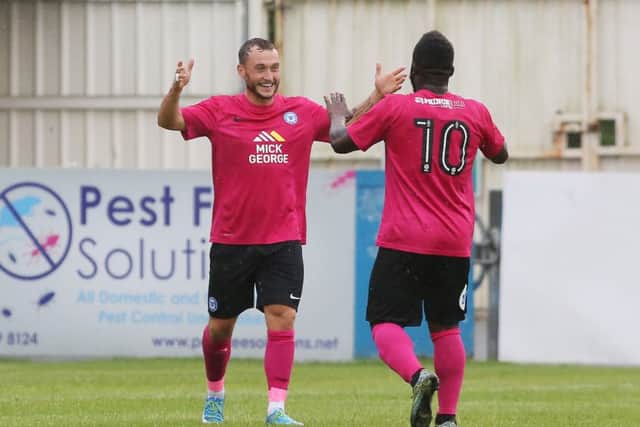 Ricky Miller celebrates his early goal at Nuneaton with Posh team-mate Junior Morias. Photo: Joe Dent/theposh.com.