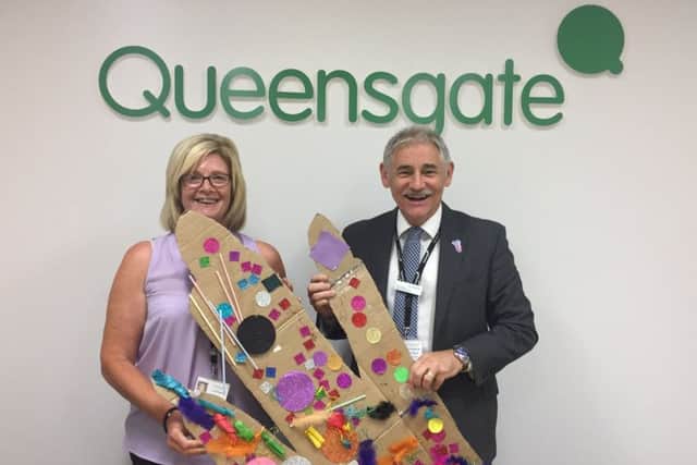 Carol Wakelin and Frank Grant from Queensgate's management team with the entry from St.Michaels Pre School.