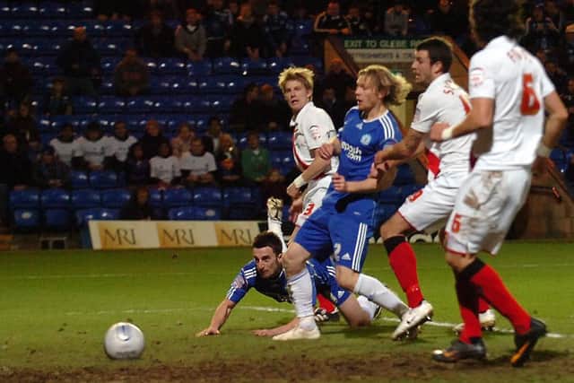 Action from a 4-4 between Posh and Southampton in a League One fixture in 2011.