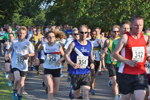 Runners in the 5K Grand Prix series at Ferry Meadows.