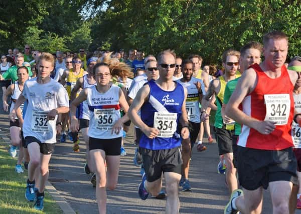 Runners in the 5K Grand Prix series at Ferry Meadows.