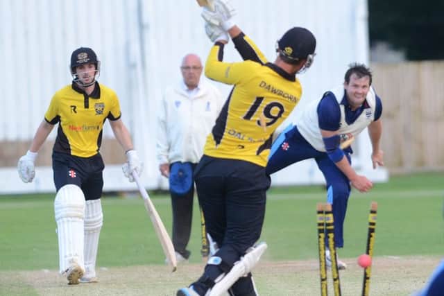 Bourne's Colin Cheer bowls Peterborough Town's Joe Dawborn in last year's Jaidka Cup Final.