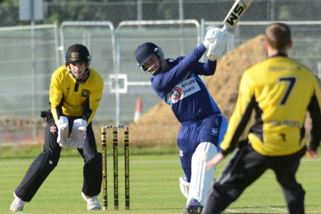 Jack Berry hits out for Bourne in last year's Jiadka Cup Final win over Peterborough Town.