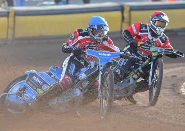 Action from heat two involving Tom Bacon (blue helmet) and Liam Carr (red) for Panthers against Sheffield. Photo: David Lowndes.