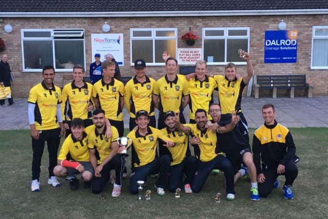 Peterborough Town celebrate their Jaidka Cup Final win.