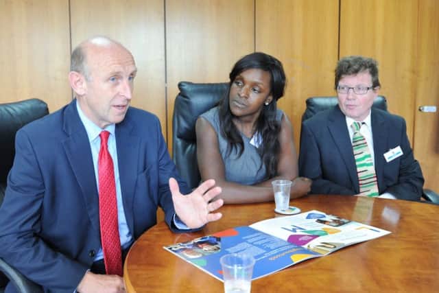 John Healey MP, shadow housing minister with Peterborough MP Fiona Onasanya at Cross Keys Homes offices with Cllr Ed Murphy EMN-170713-212422009